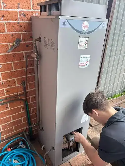 Hot water system repair in Caulfield